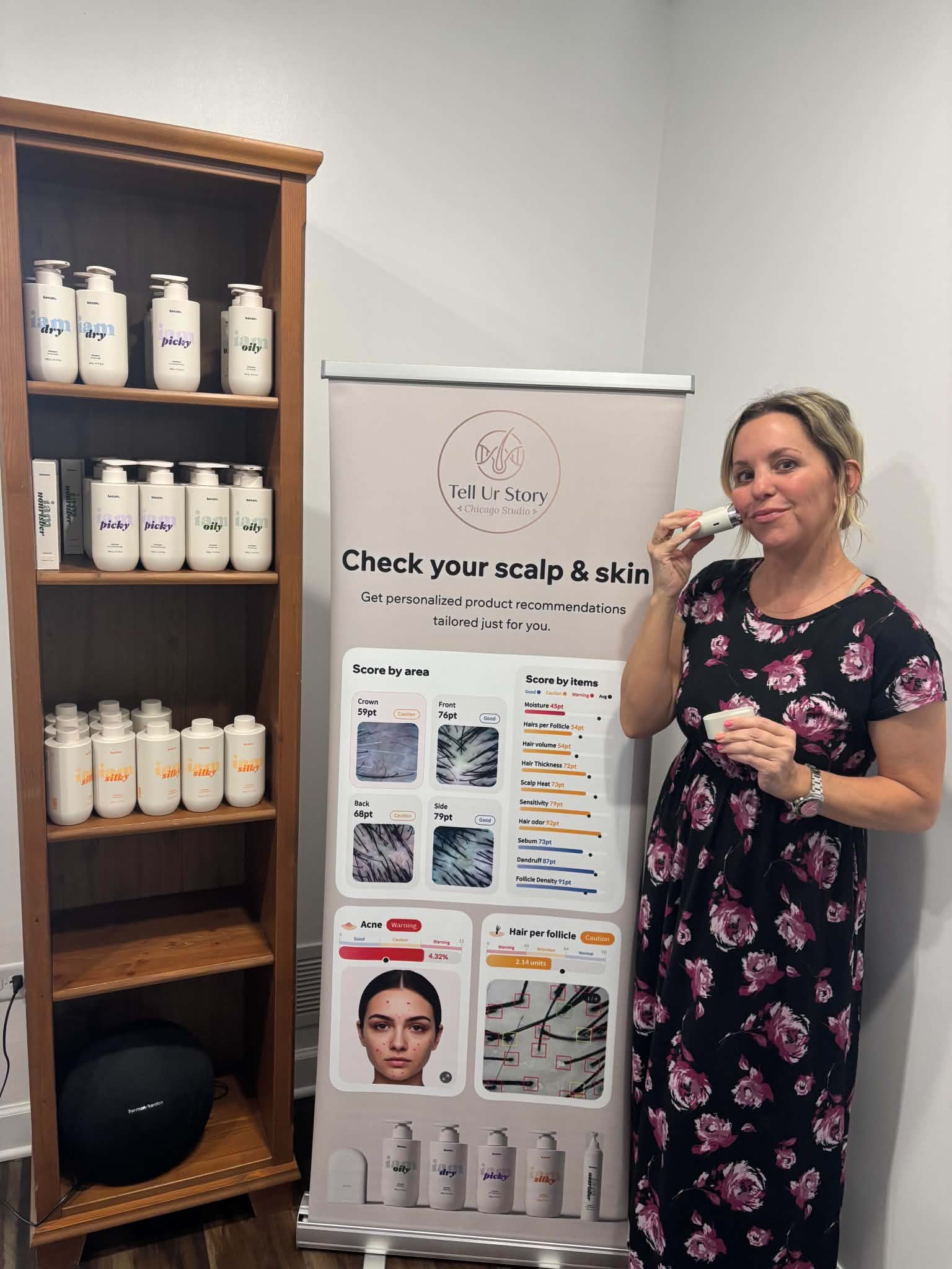 Tanya at Tell Ur Story Chicago Studio with the Becon scanner and product display